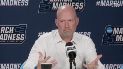 Villanova head coach Kevin Willard looking annoyed at a March Madness press conference