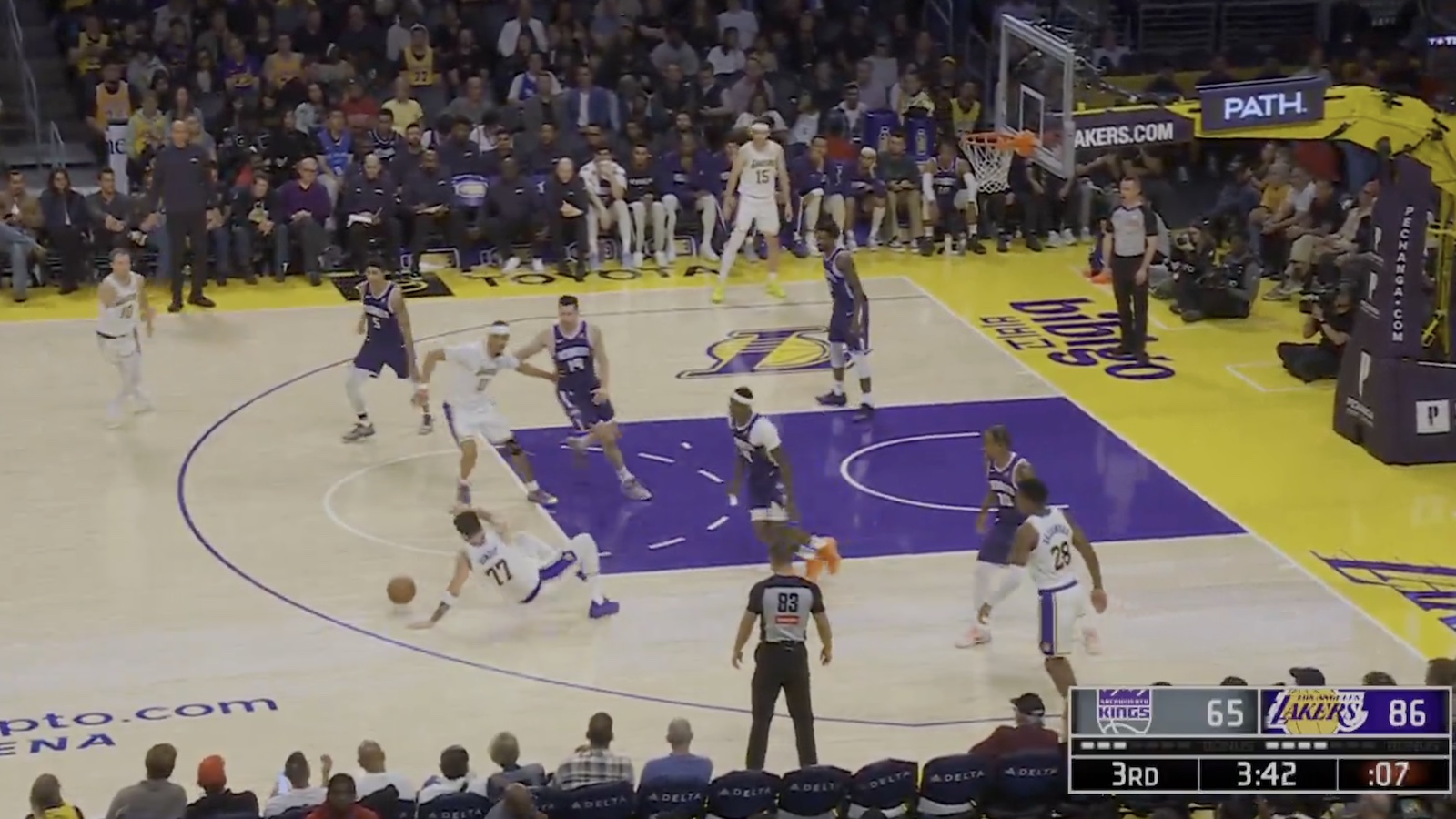 Lakers star Luka Doncic slips on the court before hitting a streetball-esque shot against the Kings