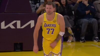 Luka Doncic talking to a teammate