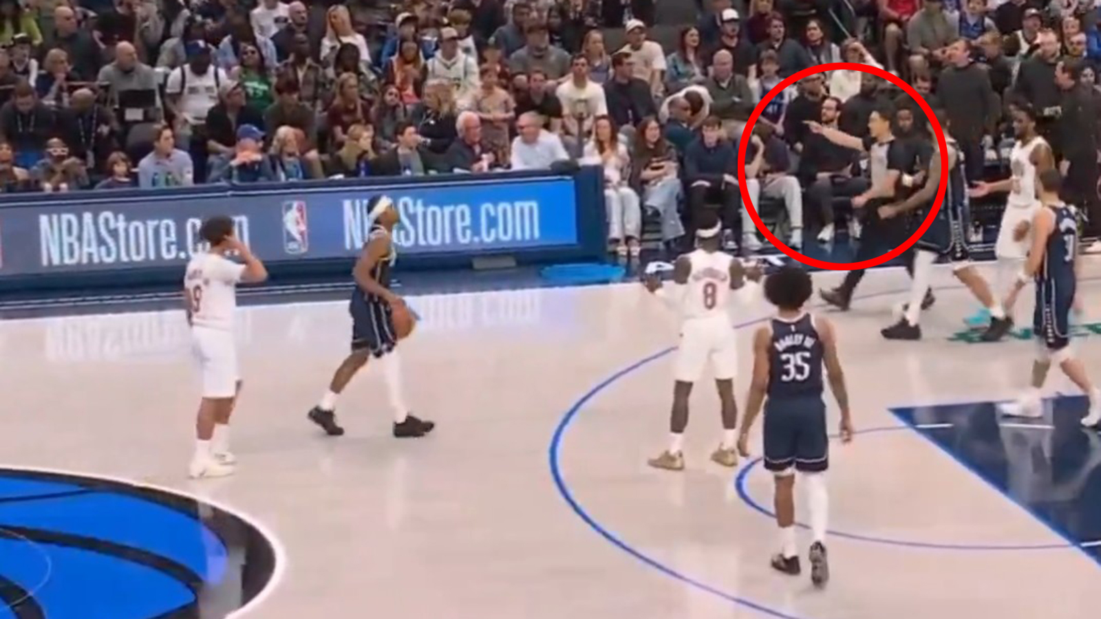 A ref makes a call during a game between the Mavericks and Cavaliers