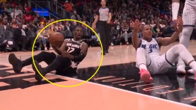 Onyeka Okongwu and Desmond Bane on the ground
