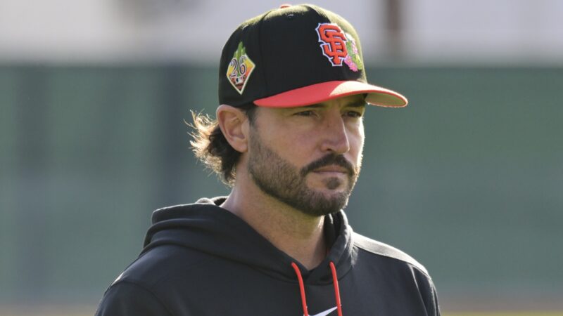 Tony Vitello in a Giants hat