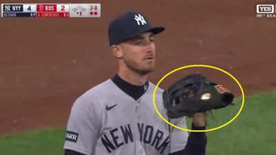 Cody Bellinger twirling his glove