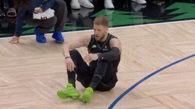 Timberwolves guard Donte DiVincenzo down on the ground with a torn Achilles tendon