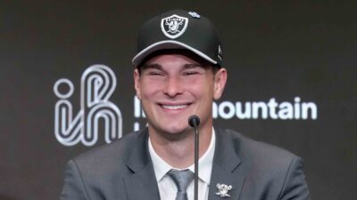 Fernando Mendoza wearing a Raiders cap
