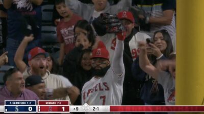 Angels outfielder Jo Adell celebrating his third home run robbery against the Mariners