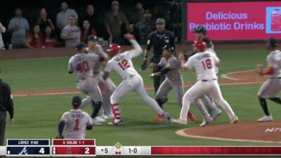 Angels' Jorge Soler and Braves' Reynaldo Lopez exchanging blows