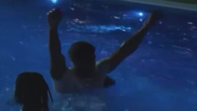 Romello Height jumping into a pool