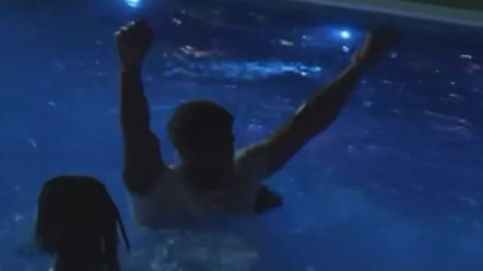 Romello Height jumping into a pool
