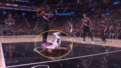 Victor Wembanyama falling to the ground