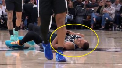 Victor Wembanyama on the ground in pain