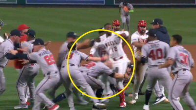 Braves manager Walt Weiss tackles Angels' Jorge Soler