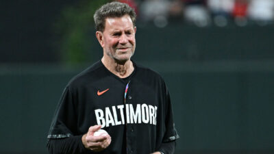Orioles legend Jim Palmer throwing out the first pitch.