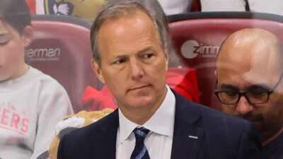 Jon Cooper looking at the ice