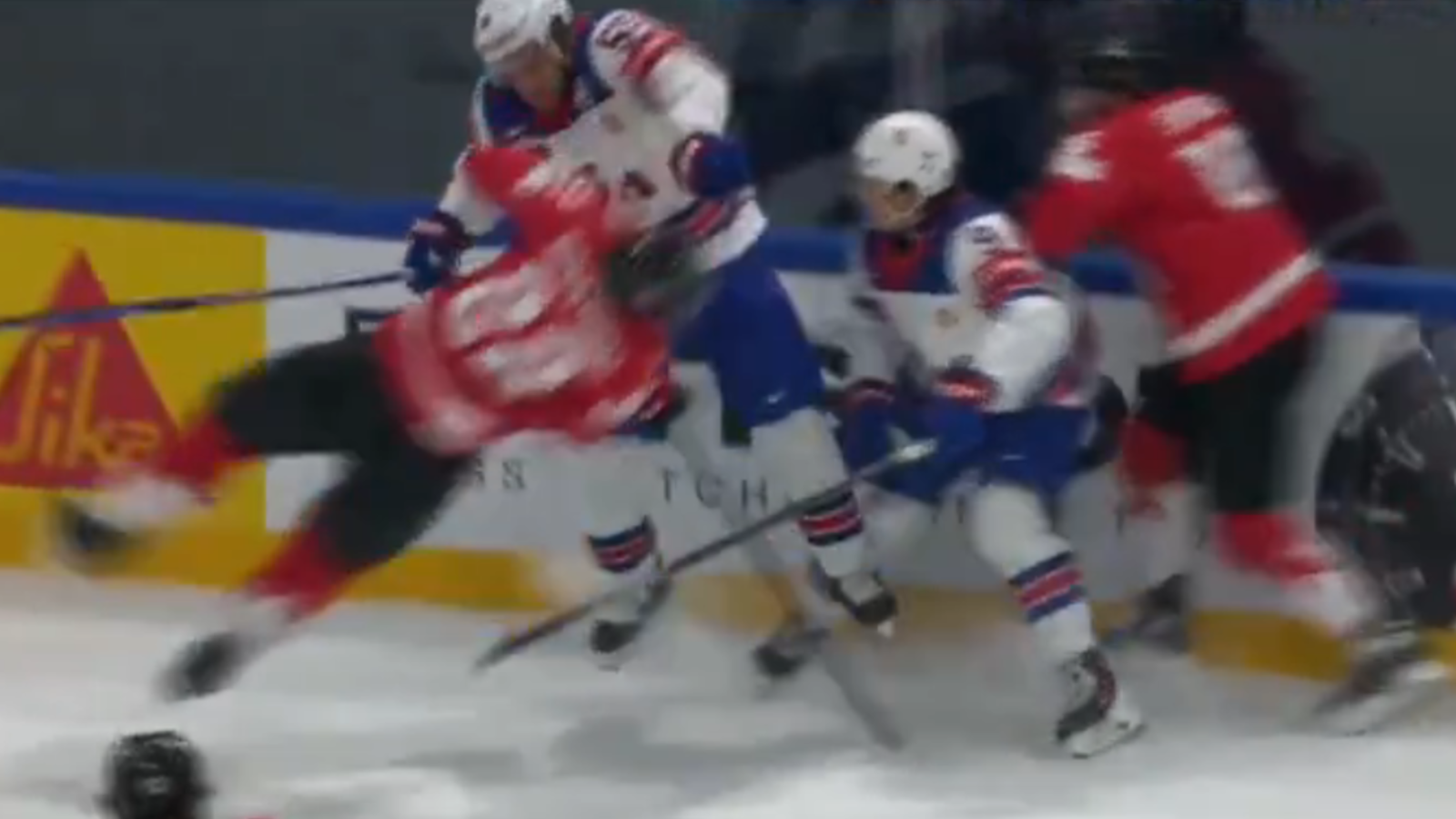 Ryan Lindgren delivers a brutal hit on Evan Bouchard.