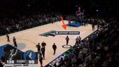 Timberwolves star Anthony Edwards walking toward the Spurs bench in game 6