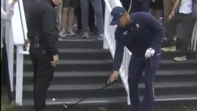Bryson DeChambeau on the stairs