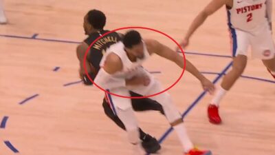 Donovan Mitchell crossing over Tobias Harris