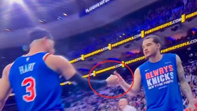 Josh Hart and Jeremy Sochan shaking hands