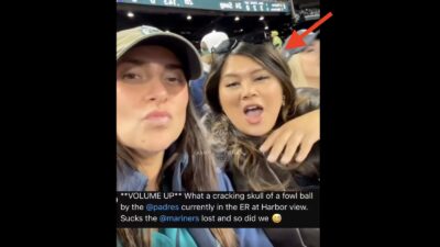 Mariners fan taking a selfie video before getting hit with a foul ball