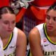 Paige Bueckers and Azzi Fudd on the bench