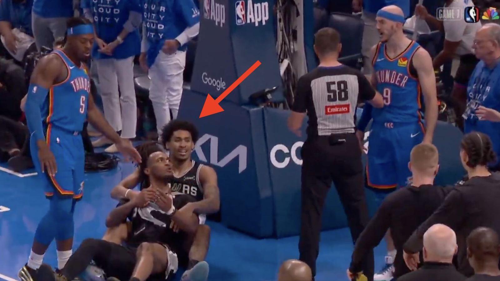 Dylan Harper holding down Stephon Castle as the latter glared at Alex Caruso during Spurs-Thunder Game 7