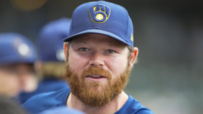 Brandon Woodruff looking on