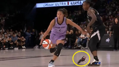 Kaitlyn Chen drives tot he basket during a WNBA game