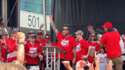 Nicolas Deslauriers re-signs with Hurricanes during Stanley Cup championship parade.