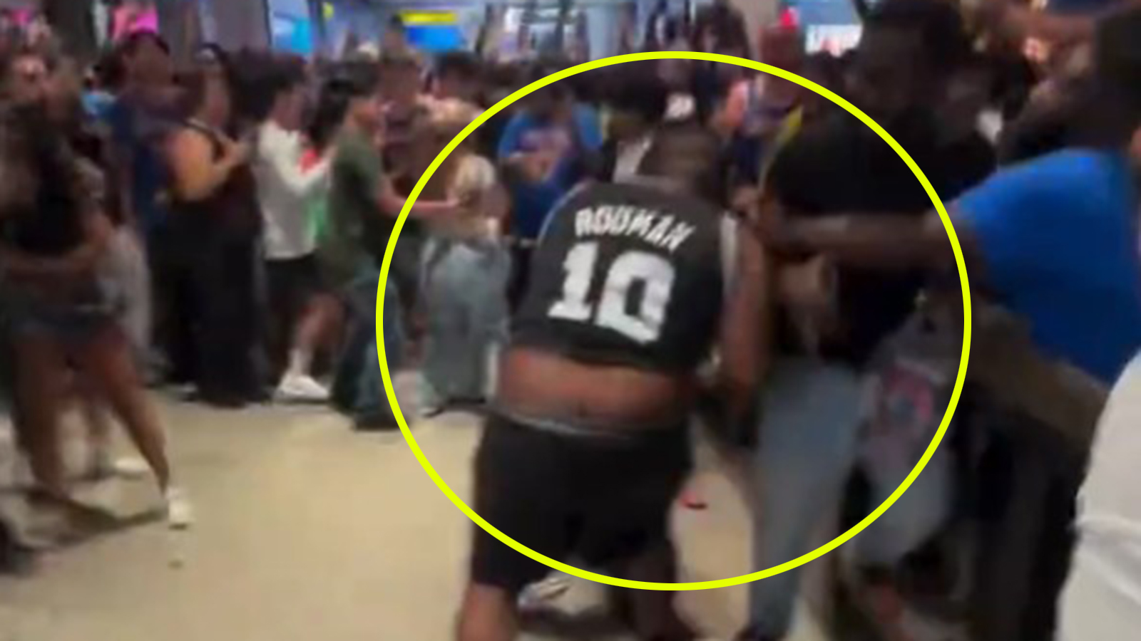 Spurs fans throwing a punch