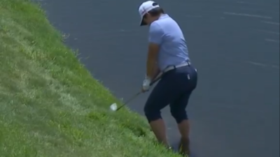 Yani Tseng chips in from the water.