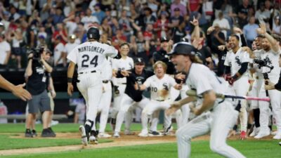 Braden Montgomery celebrating his walk-off home run with his White Sox teammates