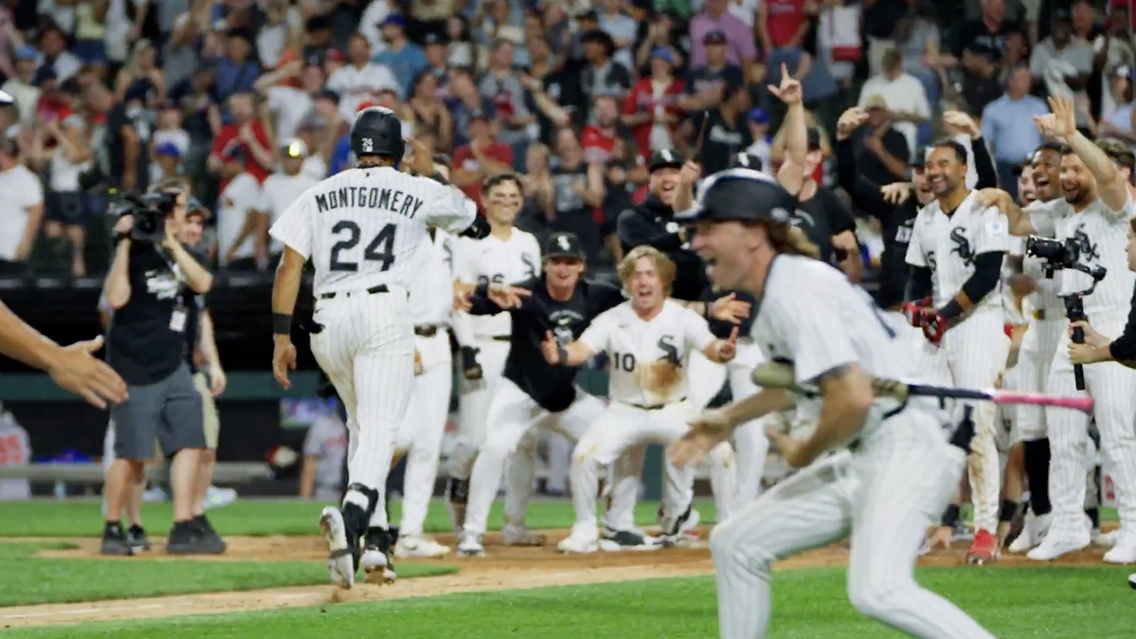 Braden Montgomery celebrating his walk-off home run with his White Sox teammates