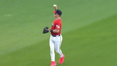Cooper Ingle throwing a ball into the stands