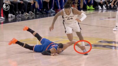 Knicks' Josh Hart tripping Spurs' Devin Vassell in Game 2 of the NBA Finals