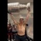 Hurricanes coach Rod Brind'Amour lifting the stanley cup while shirtless