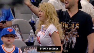 Sydney Sweeney watching Game 5 of the NBA Finals while wearing a Jalen Brunson Knicks shirt
