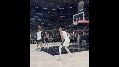 Spurs star Victor Wembanyama loading up for a full-court warm-up shot before Game 2 of the NBA Finals against the Knicks
