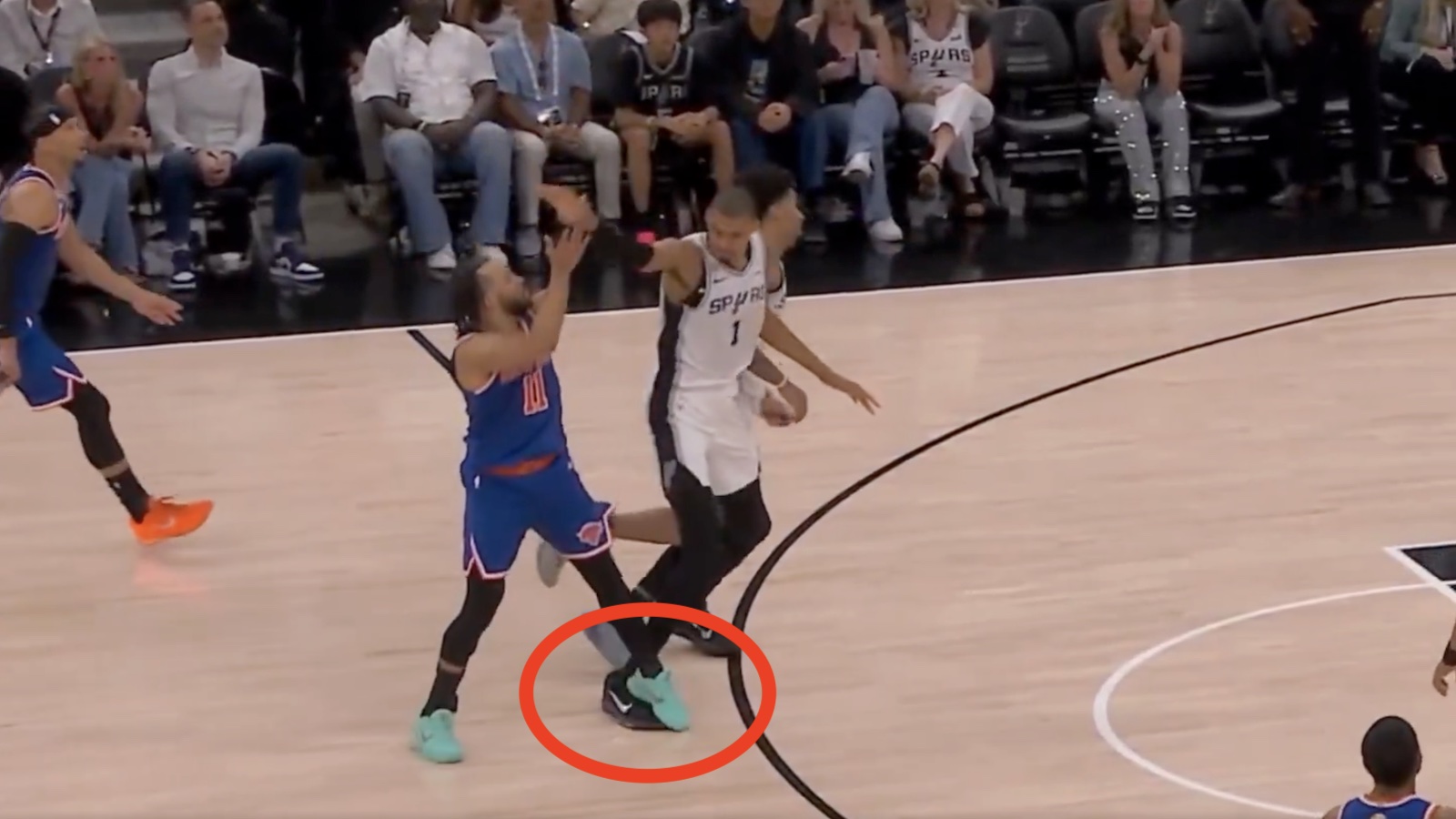 Victor Wembanyama stepping into Jalen Brunson's landing space on a shot in Game 5 of the Knicks-Spurs NBA Finals