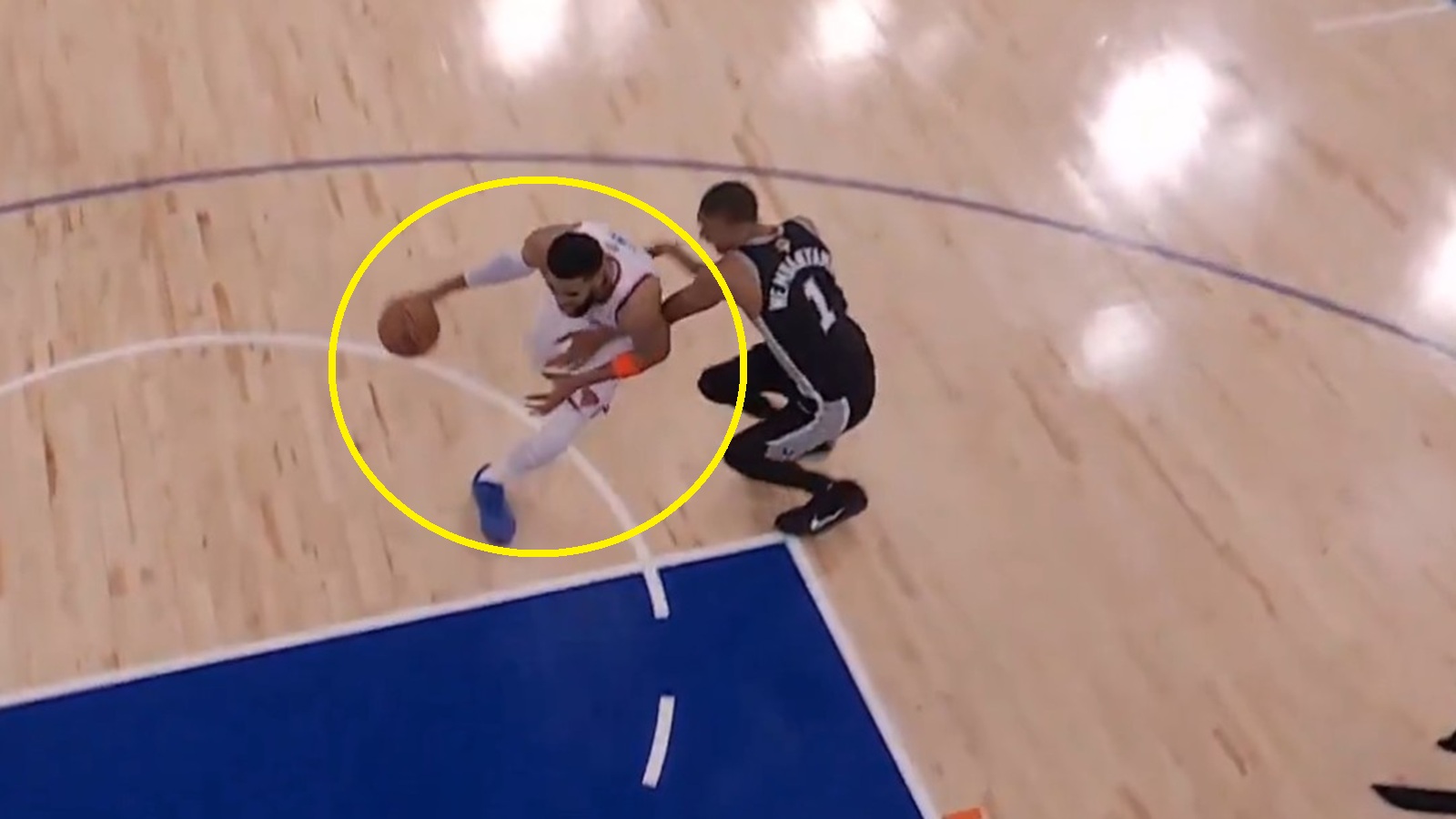 Karl-Anthony Towns driving on Victor Wembanyama