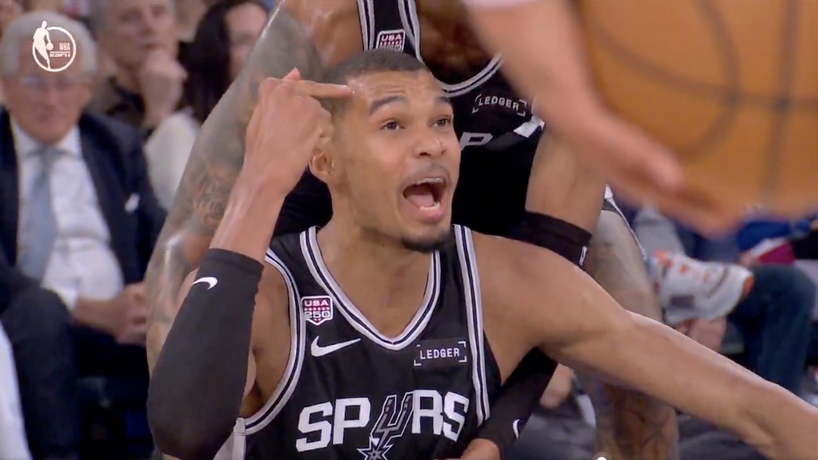 Victor Wembanyama taunting Mitchell Robinson during Knicks-Spurs Game 4 of the NBA Finals