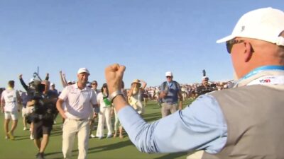 Wyndham Clark celebrating with his dad after winning the U.S. Open.