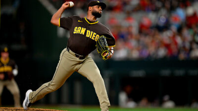 Randy Vasquez throwing a pitch.