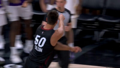Vladislav Goldin pointing at the Lakers bench