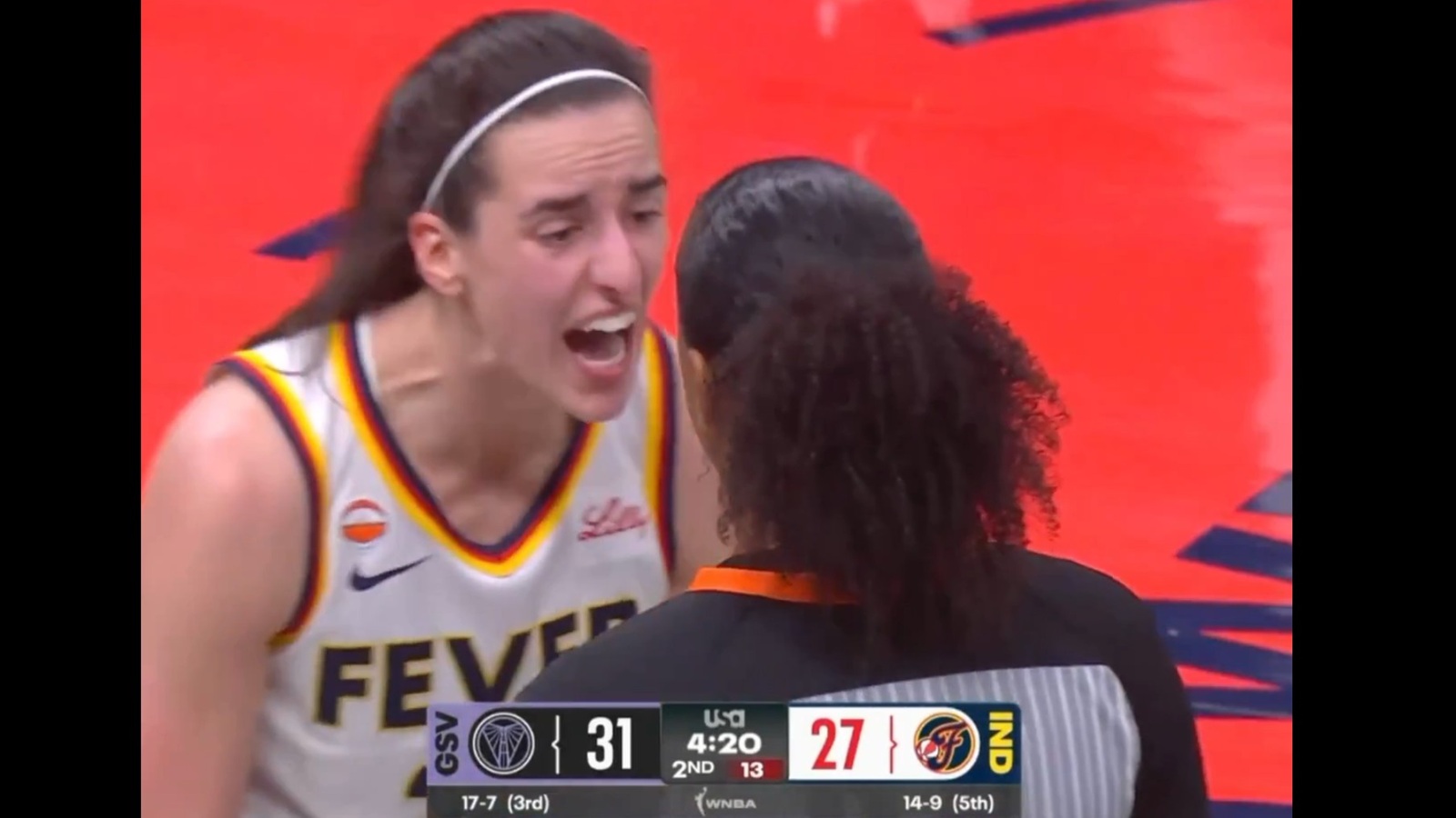 Caitlin Clark yelling at a referee