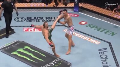Conor McGregor suffering a knee injury after his opening kick against Max Holloway at UFC 329