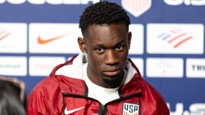 Folarin Balogun at a press conference