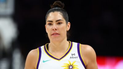 Kelsey Plum looking on