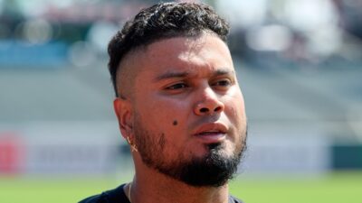 Luis Arraez looking on