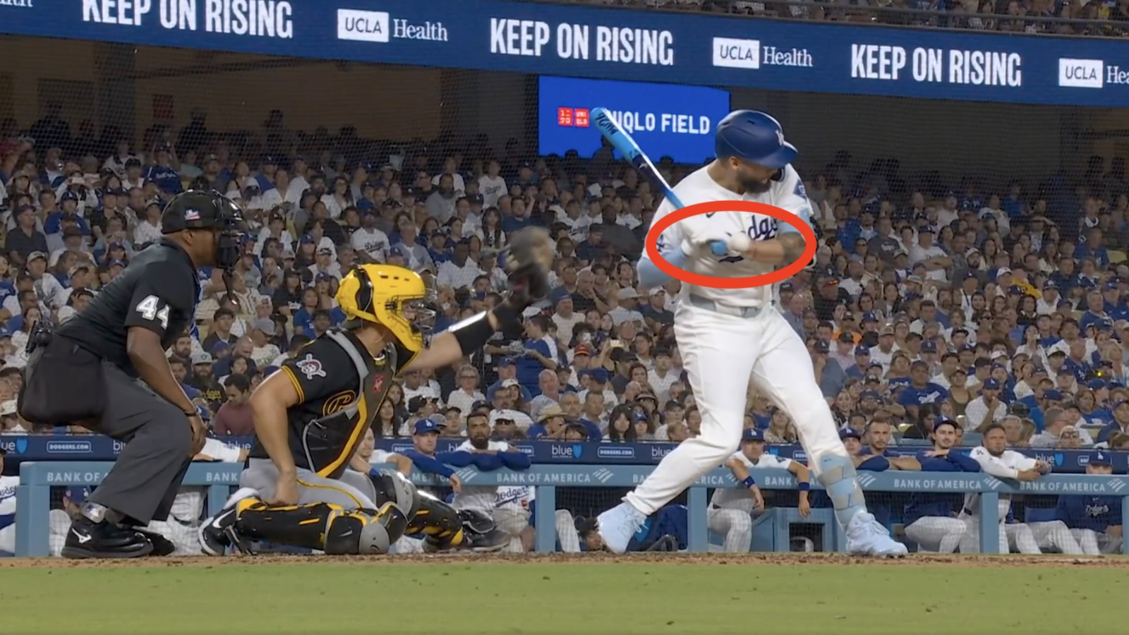 Dodgers outfielder Andy Pages getting hit in the hand by a pitch